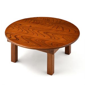 Low table / Two woods: Japanese chestnut, Japanese zelkova, finished with layers of lacquer (Fuki-Urushi) / Diameter 80 × Height 33 cm / ¥132,000 (including tax) / *Fold-up legs
